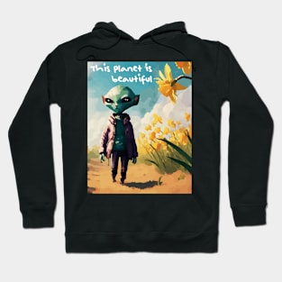 Alien walking through a vast field of yellow daffodils 3 Hoodie